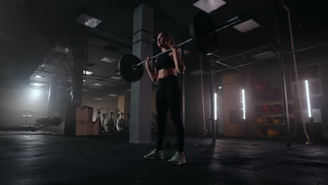 Athletic-Beautiful-Woman-Does-Overhead-Deadlift-with-a-Barbell-in-the-Gym.-Strong-female-athlete-with-muscular-body-lifting-weights-exercising-with-barbell.-women-doing-exercise-with-weights-in-gym